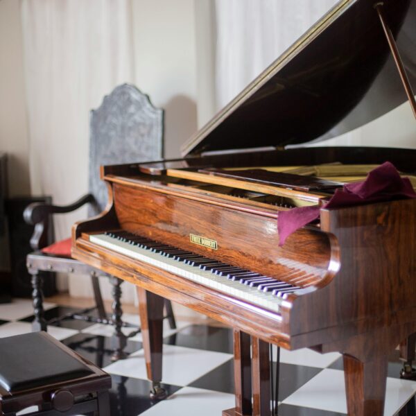 Brown Grand Piano With Chair